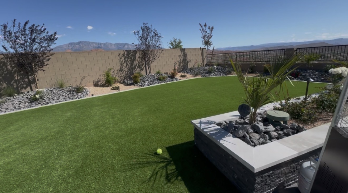 Turf and raised planter landscape